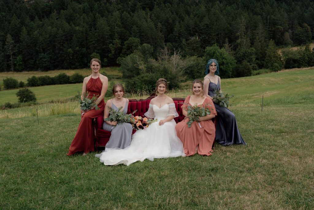 bride and bridesmaids on couch